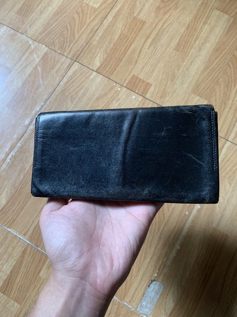 Vintage 1990s Givenchy long leather wallet (Category: Wallets & Card Holders) located in Cagayan de Oro. Submitted by premium_thrifts (Listing ID 1463139757, Image 2). Description: Used condition. Black colorway Issue: signs of wear Add shipping fee (via JRS or J&T).