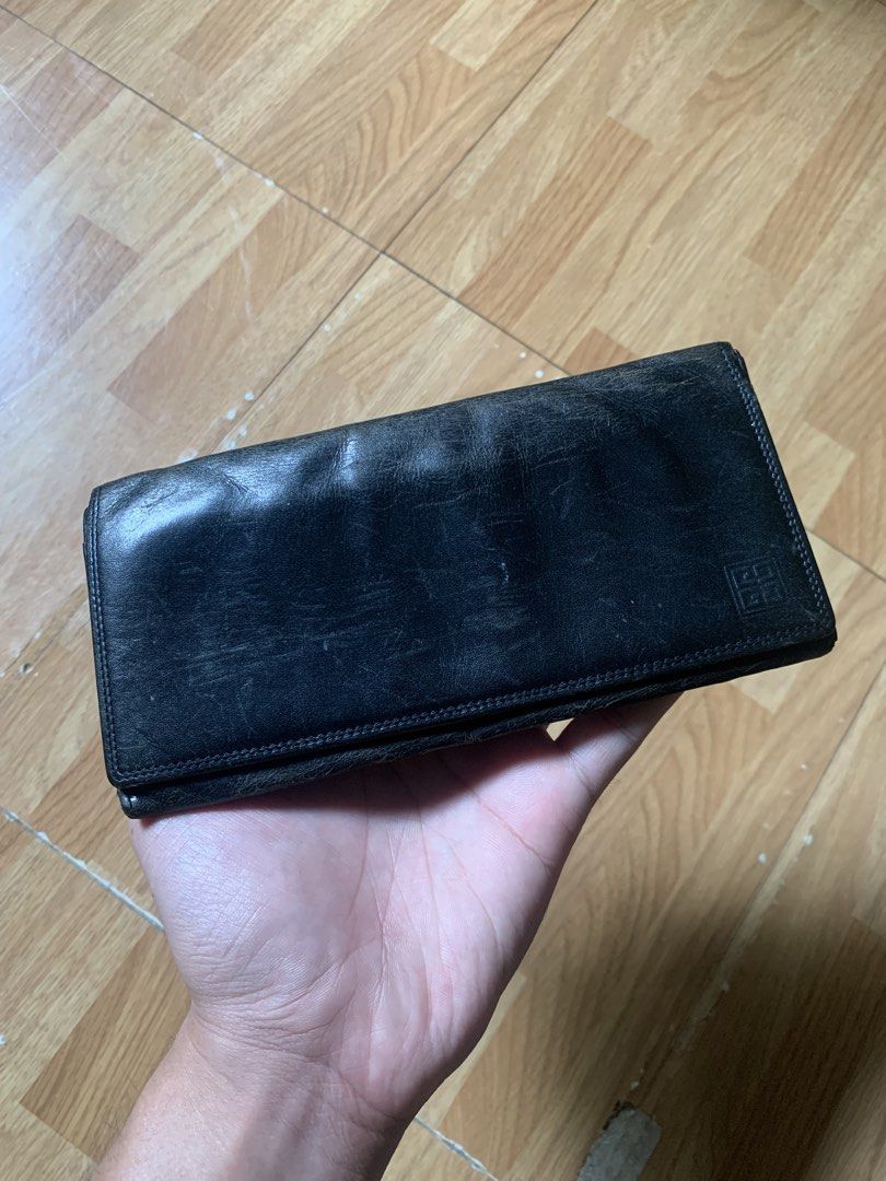 Vintage 1990s Givenchy long leather wallet (Category: Wallets & Card Holders) located in Cagayan de Oro. Submitted by premium_thrifts (Listing ID 1463139757, Image 1). Description: Used condition. Black colorway Issue: signs of wear Add shipping fee (via JRS or J&T).