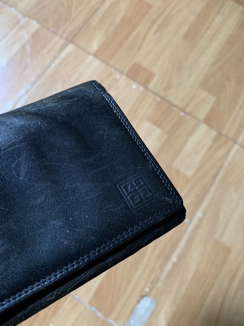 Vintage 1990s Givenchy long leather wallet (Category: Wallets & Card Holders) located in Cagayan de Oro. Submitted by premium_thrifts (Listing ID 1463139757, Image 3). Description: Used condition. Black colorway Issue: signs of wear Add shipping fee (via JRS or J&T).
