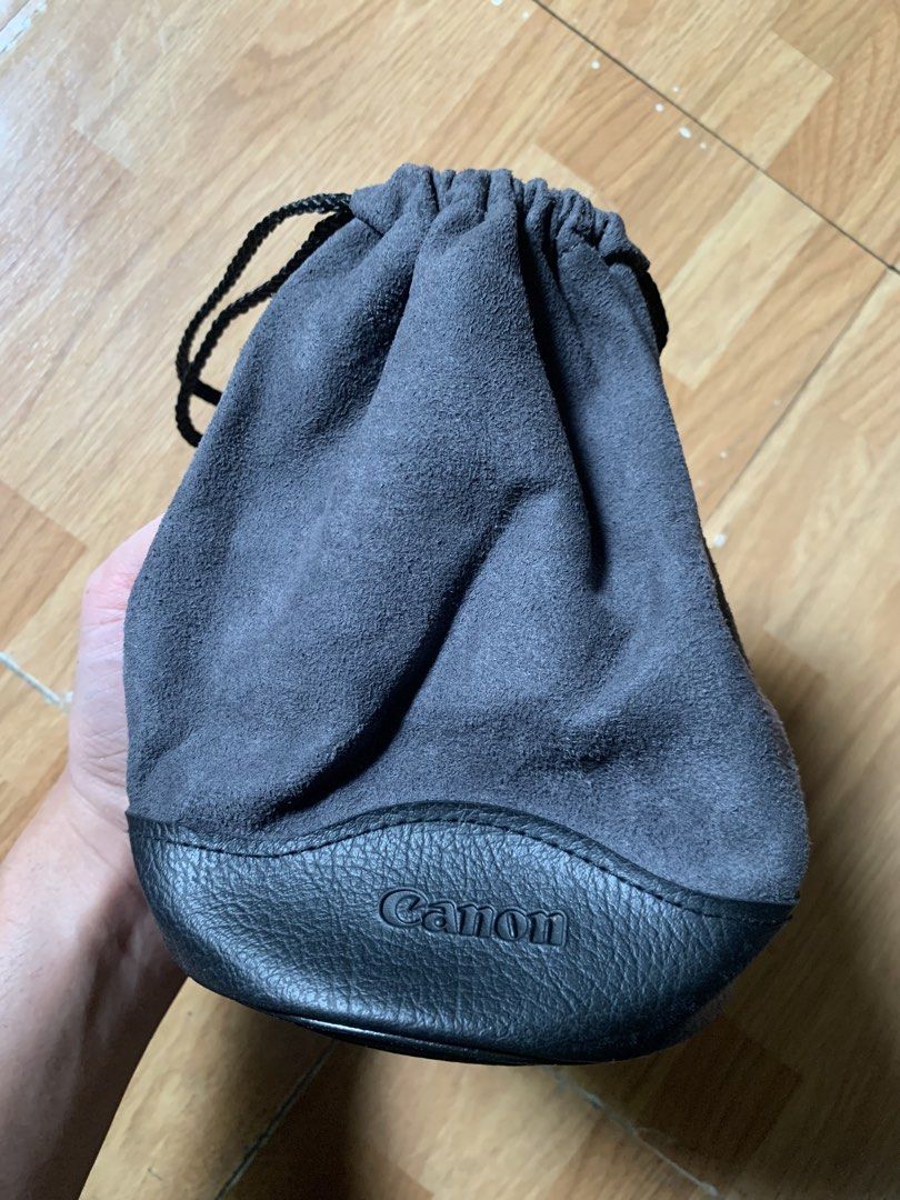 Vintage 1990s/y2k Canon small pouch (Category: Belt bags, Clutches and Pouches) located in Cagayan de Oro. Submitted by premium_thrifts (Listing ID 1463145052, Image 1). Description: Good condition. Gray colorway. Good for storage of small things or small digicams Issue: has fades Add shipping fee (via JRS or J&T).