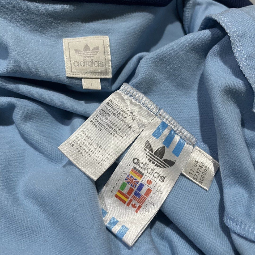 Vintage Adidas Spanish Track Jacket (Category: Coats, Jackets and Outerwear) located in Manila. Submitted by tnerb_buynsell1 (Listing ID 1463261654, Image 3). Description: Large on tag Excellent condition Color rate 9.5/10 Need wash .