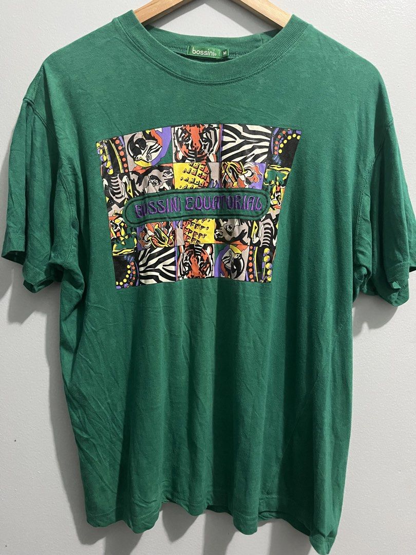 Vintage Bossini T Shirt (Category: Tshirts & Polo Shirts ) located in Manila. Submitted by mkjah (Listing ID 1463271544, Image 1). Description: Vintage 90s Bossini Equatorial Graphic Tshirt Size: medium tag (W) 22 (L) 25.5 (Sh) 23 (S) 8 Color may vary due to lighting Ready to wear 🧼 Price 350 plus shipping Please manage your expectations before placing your order. There may be slight differences in color between the actual product and photos pos