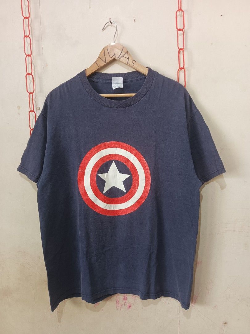 Vintage Captain America Shield (Category: Formal Shirts) located in Cebu City. Submitted by nooffense (Listing ID 1463222802, Image 1). Description: Captain America Shield Delta Pro Weight Dated 1999 Size: Large(22x28) Issue: Hairlines And Good Fade Price:650+sf Pm for more details Cebu City 📍.
