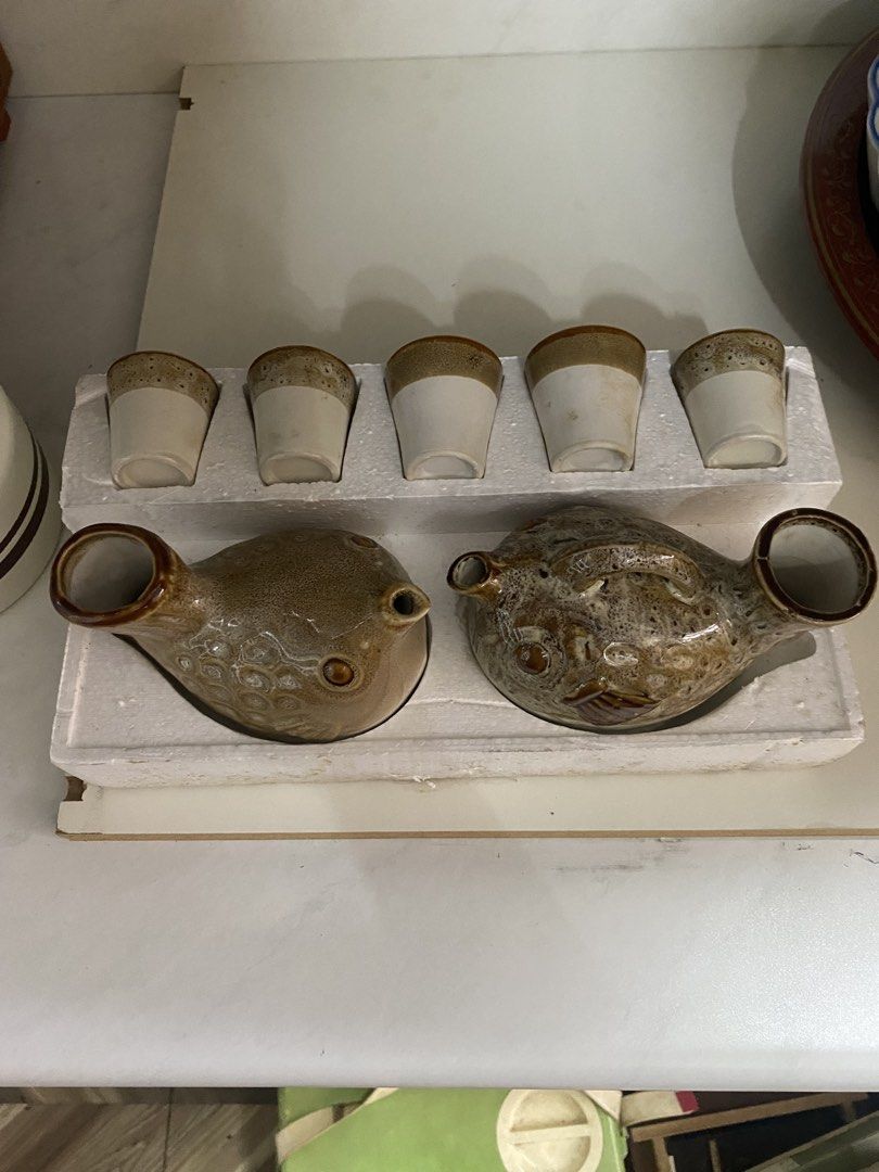Vintage Ceramic Sake 2 Pitcher 5 Cups (Category: Coffee & Tea Tableware) located in Carmona. Submitted by myy_yy (Listing ID 1463174208, Image 2). Description: ✨ Details: 2 ceramic pitchers Matching small ceramic cups Distinctive textured/glazed finish Rustic vintage aesthetic Comes with original styrofoam packaging Great for collectors, display, or serving 💰 Price: ₱200 📍 Location: Dasma, Sabang 🚚 Pick-up / delivery Selling as a set. PM if in