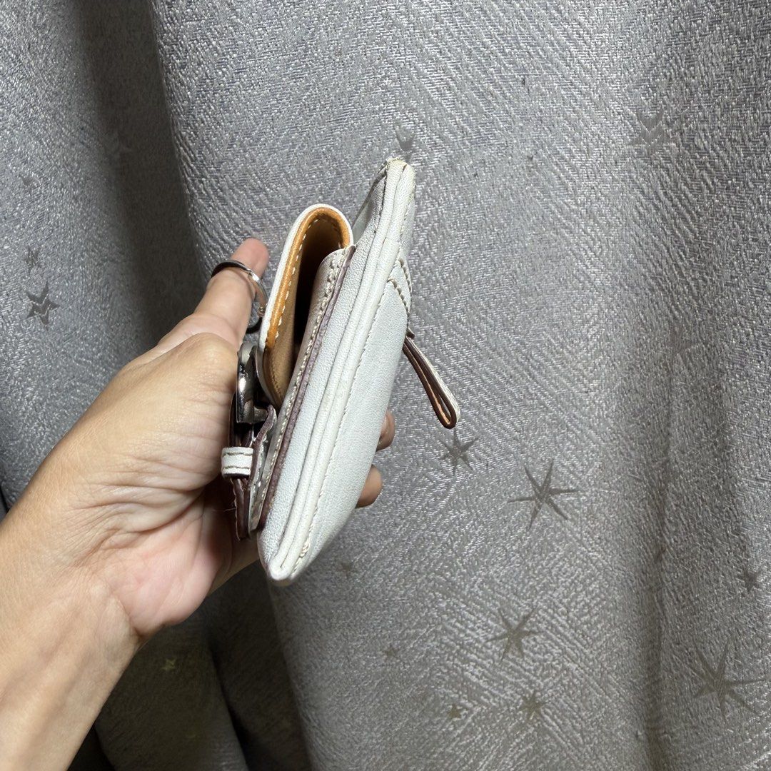 Vintage Coach Soho Small White Leather Wallet (Category: Wallets & Card holders) located in Tarlac. Submitted by alta.mayo (Listing ID 1463325023, Image 2). Description: • YKK zip • MADE IN CHINA Guaranteed 💯% Authentic ❎ No Reservation 📌 Mop: Gcash 📌 Courier: JNT 📌 Location: Tarlac .
