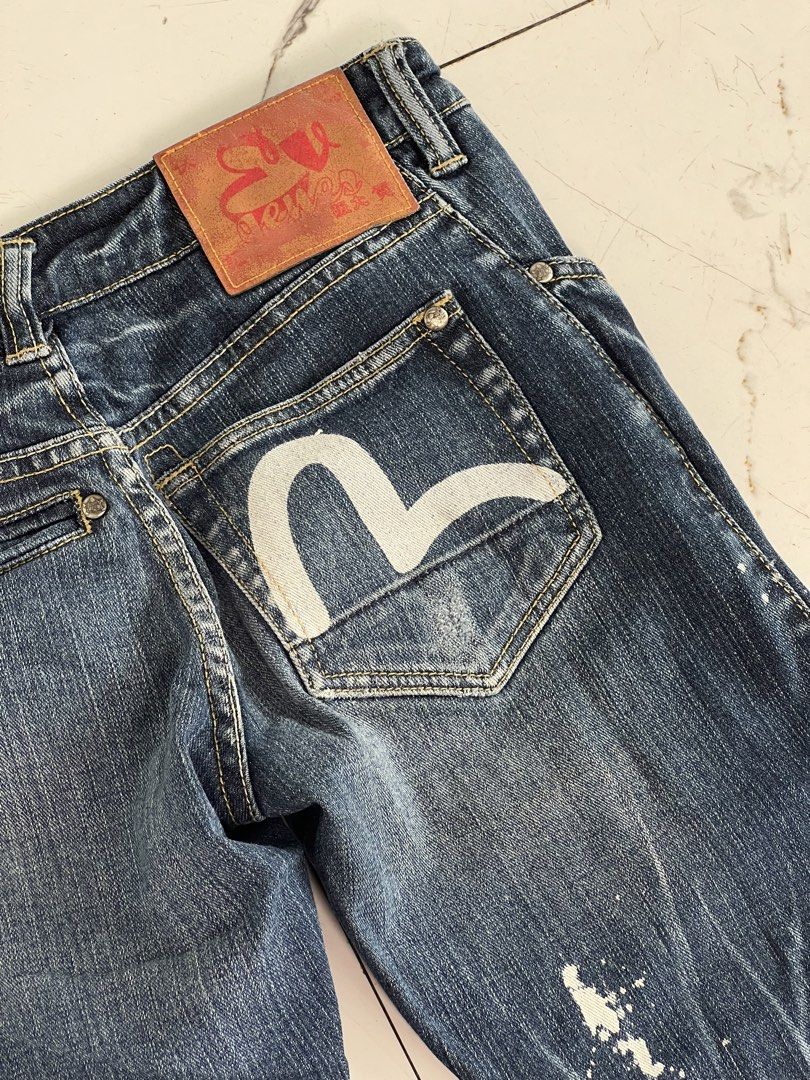 Vintage Evisu Japan Seagull Capri (Category: Jeans) located in Manila. Submitted by thriftwawi (Listing ID 1463157271, Image 2). Description: waist -29 Lenght 27 - Dark wash Evisu denim jeans - Iconic Evisu logo on back pockets - Unique white paint splatter effect - Cropped leg with button details at the hem - Perfect statement piece for your denim collection.