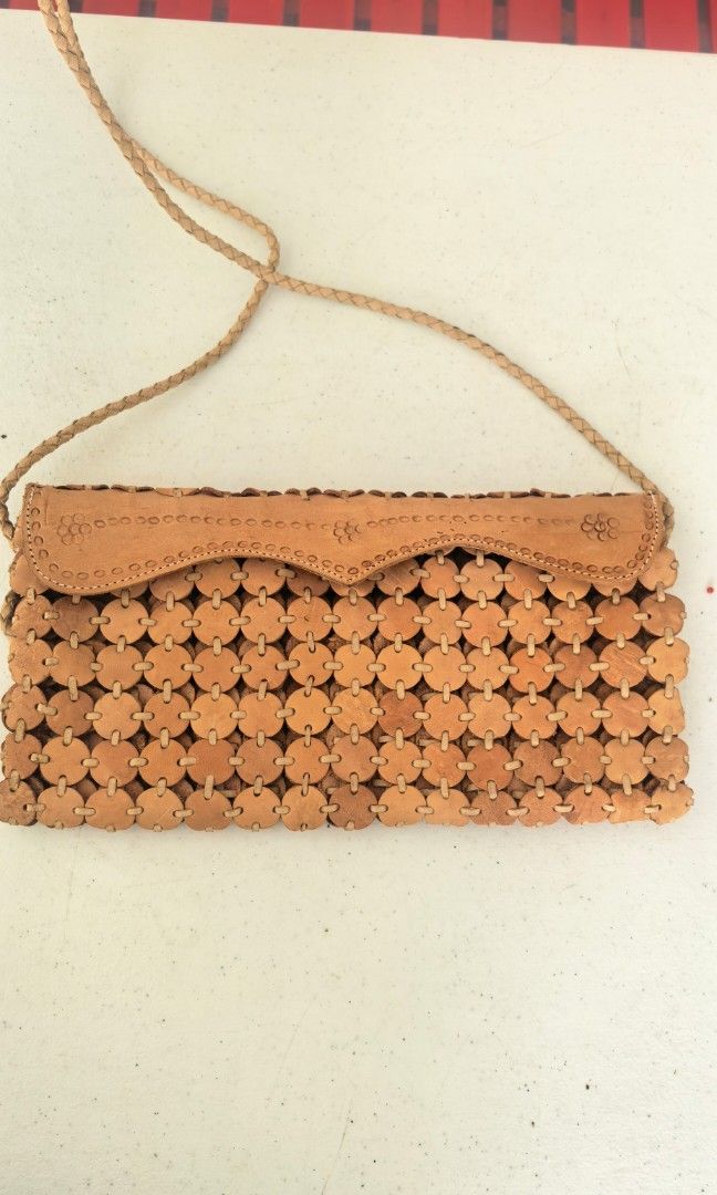 Vintage leather clutch or sling (Category: Clutches) located in Tuguegarao City. Submitted by zenphoenix-7ad615 (Listing ID 1463131433, Image 1). Description: Sling Can be use as clutch 12 by 6 inches.