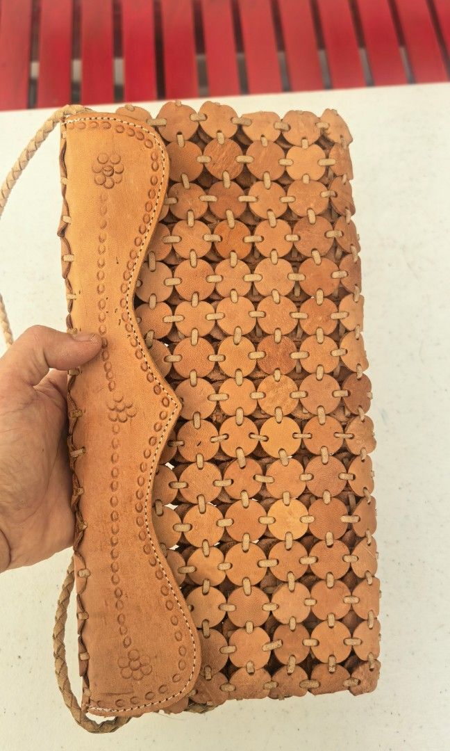 Vintage leather clutch or sling (Category: Clutches) located in Tuguegarao City. Submitted by zenphoenix-7ad615 (Listing ID 1463131433, Image 2). Description: Sling Can be use as clutch 12 by 6 inches.