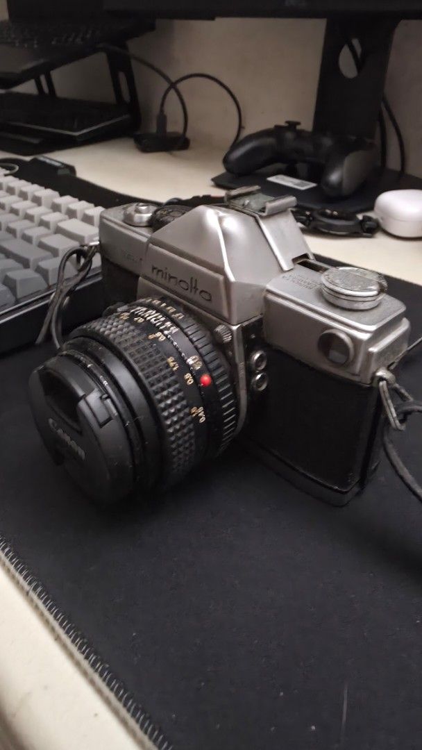 VINTAGE Minolta sr7 (Category: Cameras) located in Makati City. Submitted by jirojarin (Listing ID 1463172325, Image 3). Description: - Vintage Minolta SR-7 film camera - minolta 50mm prime lens - Classic silver and black body - Comes with a strap - Canon lens cap included currently untested but last time used it's working. price is negotiable..