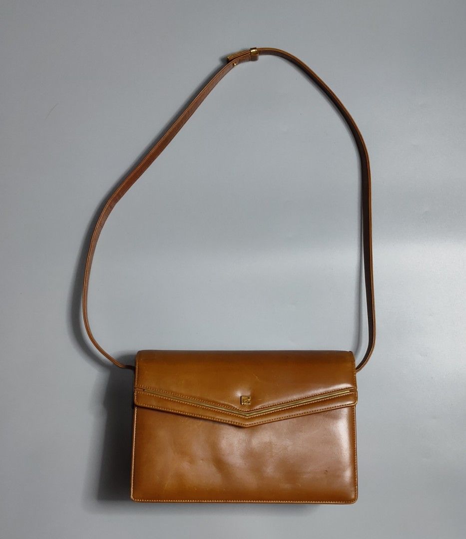 Vintage Pierre Balmain Brown Bag (Category: Luxury Bags & Wallets) located in Bolinao. Submitted by tokiya. (Listing ID 1463172563, Image 2). Description: Vintage Pierre Balmain Pwede kili bag, pwede sling bag Size: 10inches width, 7inches length May mga scratches restore niyo nalang.