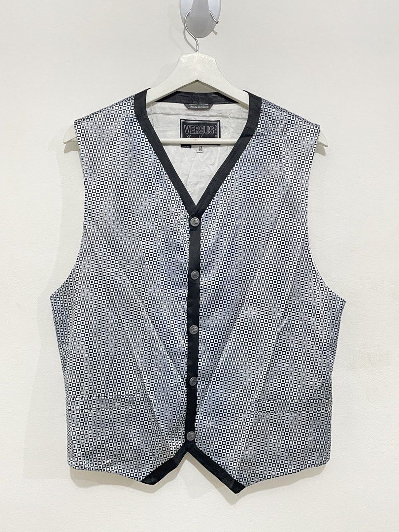 Vintage Versus Gianni Versace Vest (Category: Luxury Apparel) located in Santa Rosa. Submitted by saksthriftavenue (Listing ID 1463227094, Image 1). Description: 90s Versus Gianni Versace vest, featuring optical geometric pattern. Black trim, button details, and adjustable back strap. Made in Italy. Armpit to armpit: 20 inches Length: 23 inches .