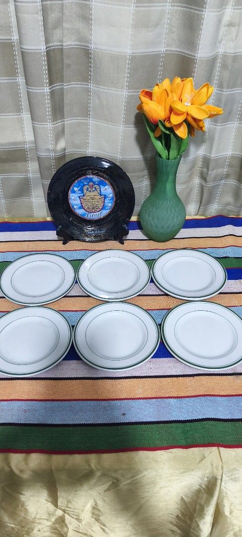 VINTAGE white ceramic restaurant ware small plate (Category: Dinnerware & Cutlery) located in Manila. Submitted by shawn0320_fish (Listing ID 1463260863, Image 2). Description: Design: Durable white glazed ironstone with a dark green band pattern circling the rim. Size: Approximately 6 inches in diameter, typically used as a bread and butter or small dessert plate. Origin/Style: Classic heavy-duty diner or railroad china, similar to pieces made b