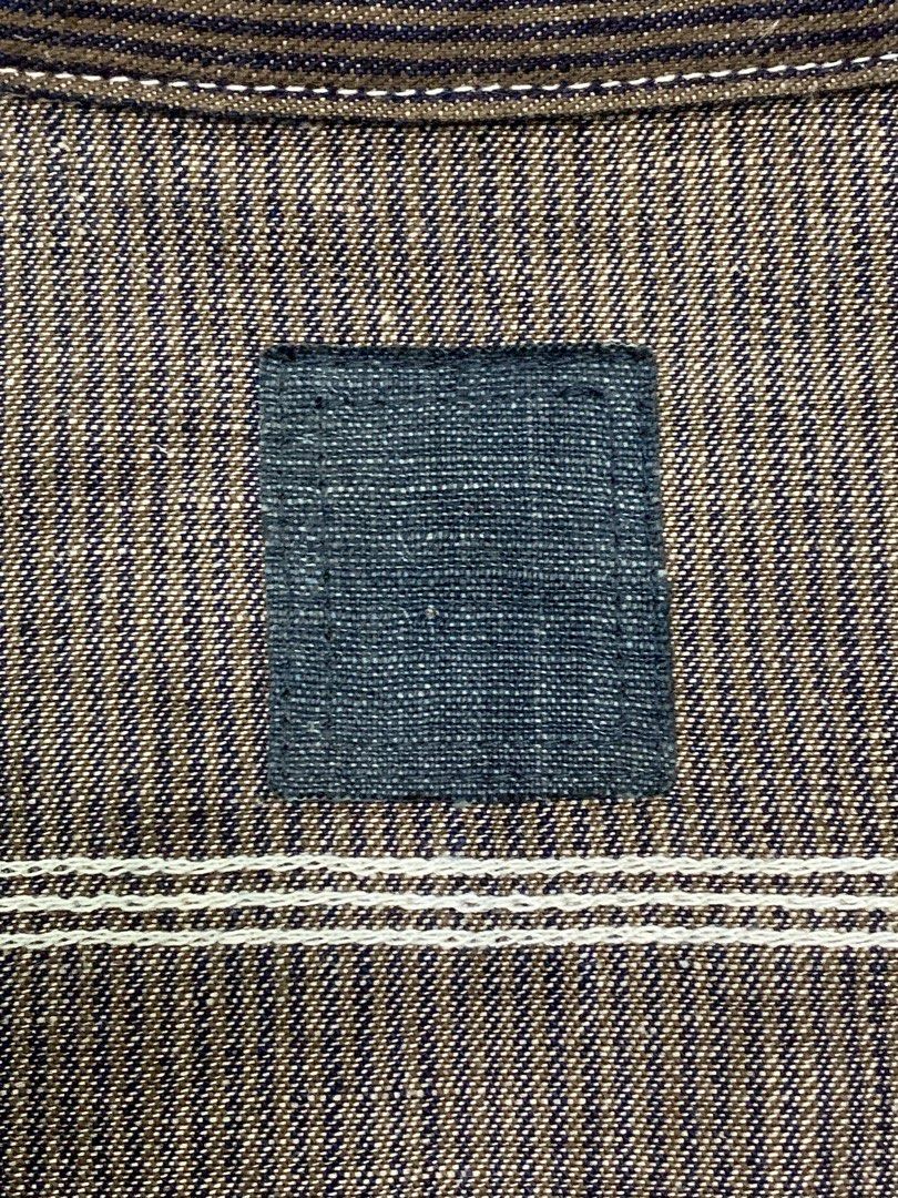 VISVIM ICT OVERPASS STRIPED L/S SHIRT (Category: Formal Shirts) located in Cavite. Submitted by ___layern0ne (Listing ID 1463264088, Image 2). Description: About the product: • Visvim ICT Overpass Striped L/S shirt with thick cotton-linen stripe fabric, brass half-zip collar, red I.C.T chest embroidery, and vintage fabric paneled cuffs • Ideal for cooler seasons, pair with jeans or chinos for versatile rare ICT styling • Concealed Bandana Trim: T