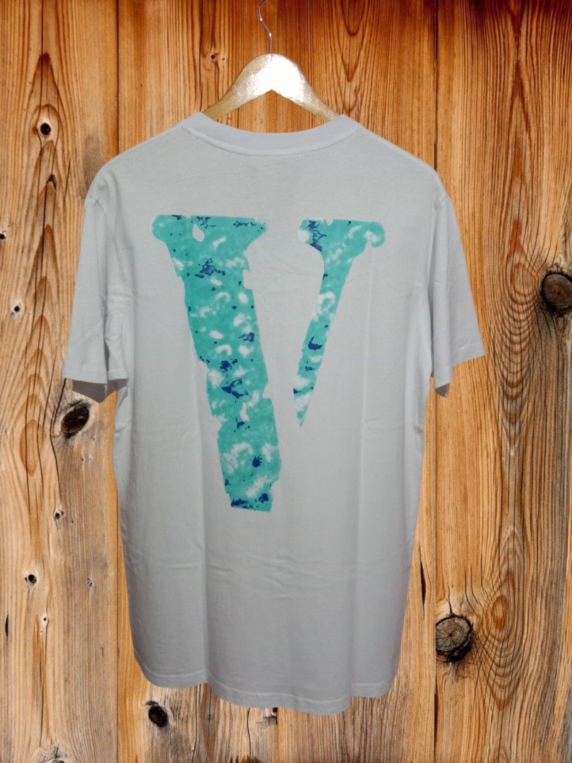 Vlone Yams Day 2020 Tee (Category: Tshirts & Polo Shirts ) located in Davao. Submitted by ayeeasyshop13 (Listing ID 1463279913, Image 3). Description: This is a white VLONE Yams Day 2020 Tee featuring a graphic print of a young child surrounded by yellow stars on the front (EXTREMELY RARE) As new condition Size Large on tag Dimension 21/29 1500 + SF.