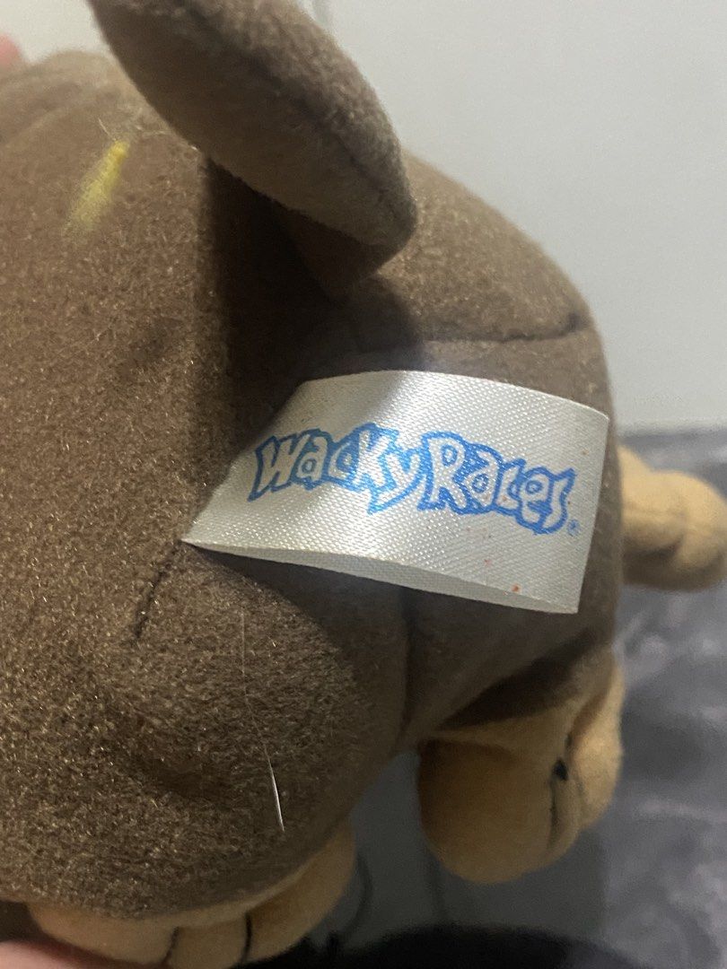 Wacky Races Plush Dog Toy (Category: Plushies & Soft Toys) located in Manila. Submitted by kuya_moto (Listing ID 1463247149, Image 2). Description: - Adorable plush toy from the classic cartoon Wacky Races. - Features the iconic brown dog character. - Soft and squishy material, perfect for cuddling. - Includes a small loop at the top, ideal for hanging or display. - A must-have collectible for fans of Wacky Races!.