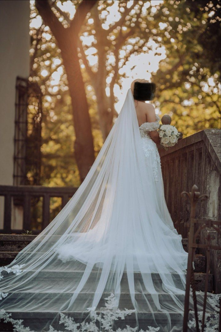 Wedding gown (Category: Evening dresses & gowns) located in Cebu City. Submitted by prelovedbymecebu (Listing ID 1463322276, Image 3). Description: Made by Yoko Sato Cebu Custom off-shoulder wedding gown featuring a sweetheart neckline, exquisite 3D floral appliqués and intricate beadwork across the bodice, and a graceful layered tulle skirt. Measurements: Please check photo Not yet dry cleaned used only for 9hours Selling for 20k Negotiable Loc 