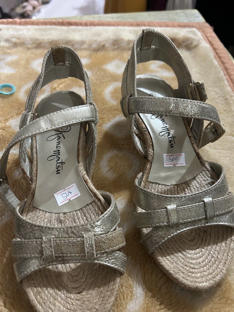 Wedge golden jute material (Category: Flats & Sandals) located in Cavite. Submitted by cecitrifthshop (Listing ID 1463132385, Image 1). Description: Golden wedge sandal jute material like new size 22 cm .