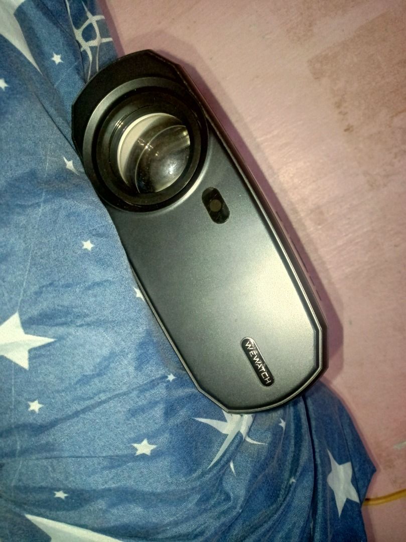 WeWatch Projector with Cables (Category: Projectors) located in Manila. Submitted by dxnnatello (Listing ID 1463184459, Image 3). Description: - WeWatch Projector V50 - Projects a clear image (230 Ansi lumens) - Works well, never pa napaayos - Comes with all necessary cables ( cord and free 1M HDMI ) - Ideal for movie nights and presentations (gamit na gamit din if you're a teacher) - Compact and portable design. - Clear audio - can use to cast y