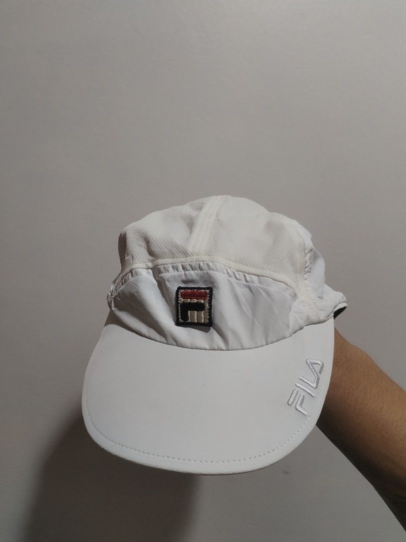 White Fila Cap (Category: Caps & Hats) located in Naga. Submitted by basejohnpa64527 (Listing ID 1463146896, Image 1). Description: - Classic white Fila cap - Features iconic Fila logo on the front - Made from 100% polyester - Adjustable strap at the back for a customized fit - Ideal for both sports and everyday casual outfits - Simple, clean, and versatile design.