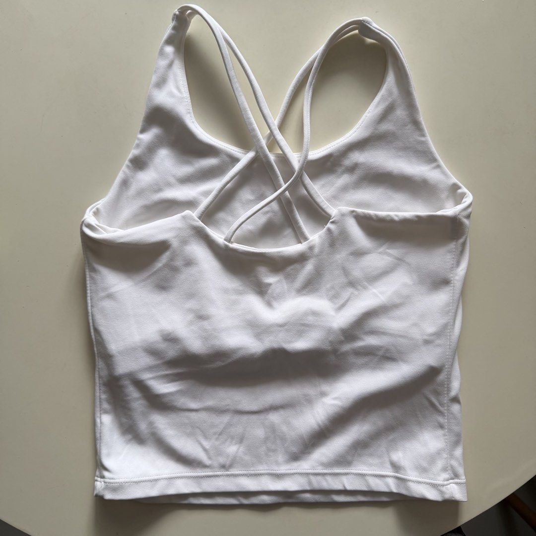 White Fitted Top Size Small (Category: Activewear) located in Manila. Submitted by yasminehannah (Listing ID 1463127495, Image 3). Description: No pads. Size small. Loved it but i have a new white top already. perfect for workouts..