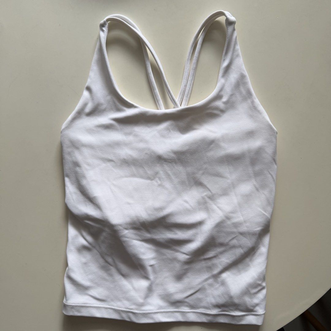 White Fitted Top Size Small (Category: Activewear) located in Manila. Submitted by yasminehannah (Listing ID 1463127495, Image 2). Description: No pads. Size small. Loved it but i have a new white top already. perfect for workouts..