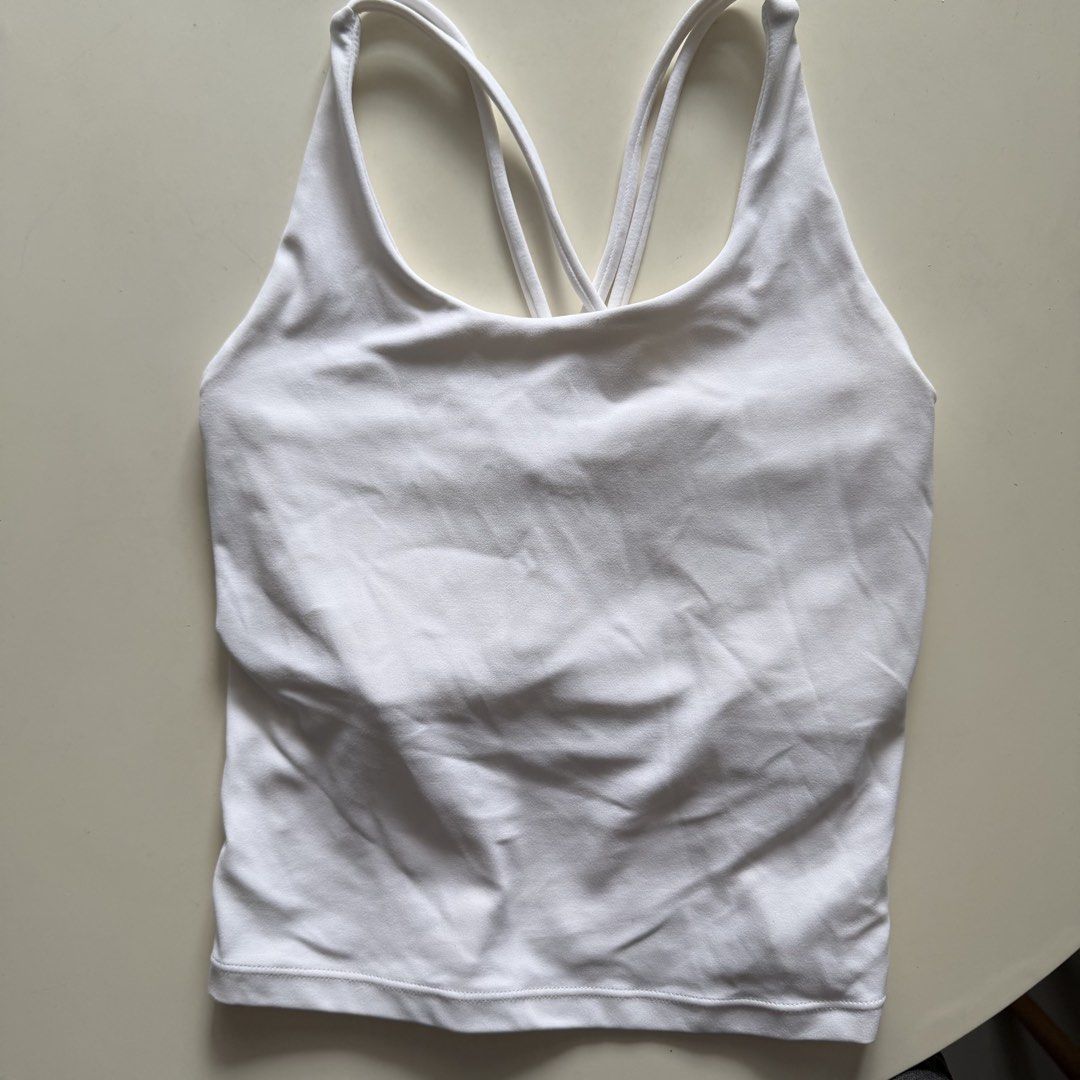 White Fitted Top Size Small (Category: Activewear) located in Manila. Submitted by yasminehannah (Listing ID 1463127495, Image 1). Description: No pads. Size small. Loved it but i have a new white top already. perfect for workouts..