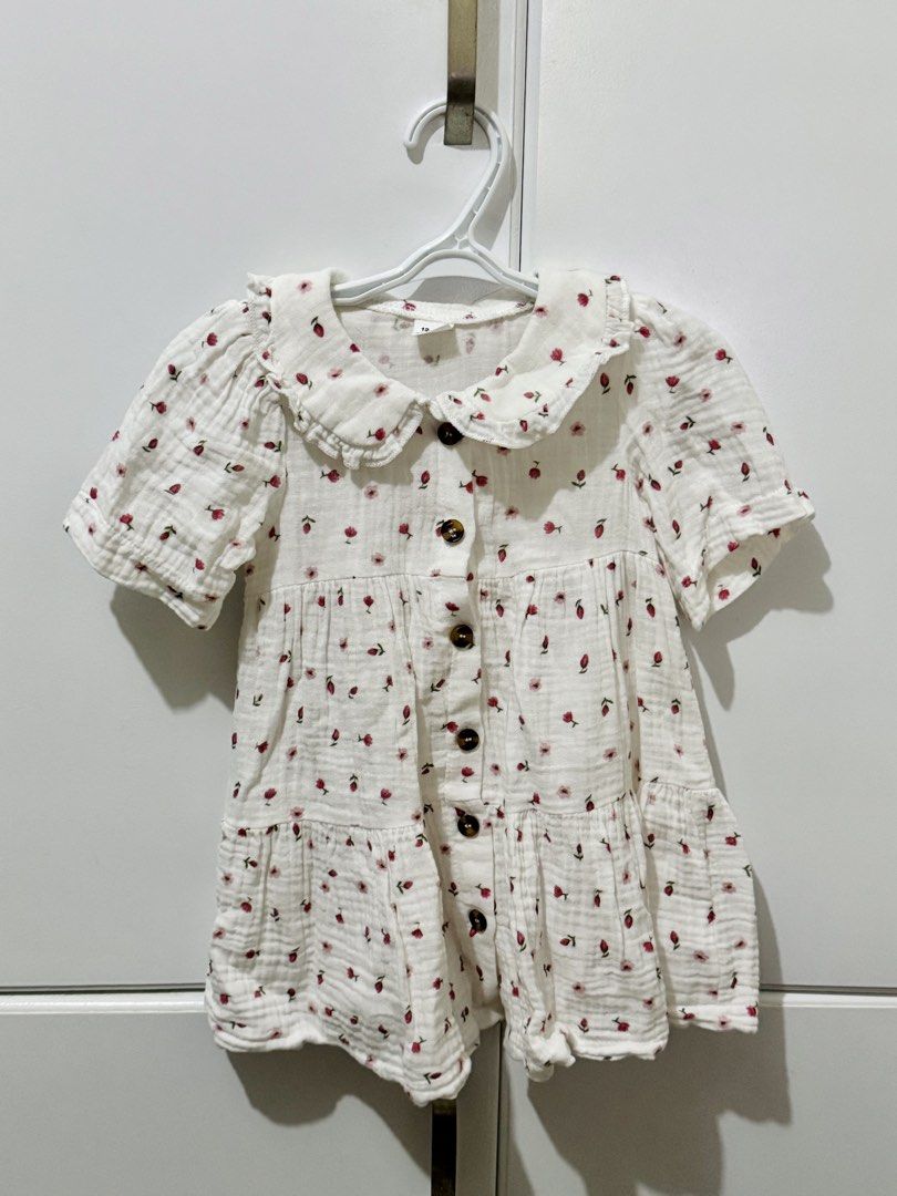 White Floral Baby Romper with Ruffle Collar (Category: Babies & Kids Fashion) located in Cabanatuan. Submitted by floy_francisco (Listing ID 1463286421, Image 1). Description: - Cute white baby romper - Sweet all-over pink floral print - Features a ruffled collar - Button-down front for easy dressing - Short sleeves - Tiered ruffles at the bottom - Muslin fabric - 12-18months.