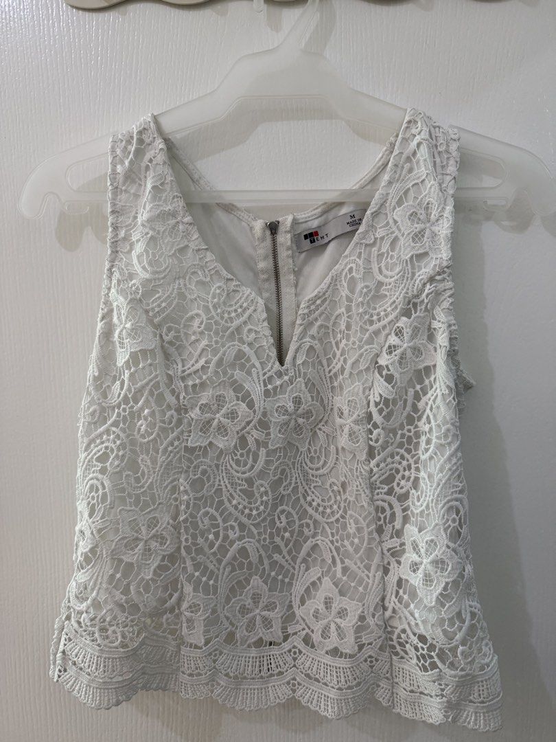 White Lace Sleeveless Top (M) (Category: Sleeveless) located in Quezon City. Submitted by graceavm. (Listing ID 1463134913, Image 2). Description: - white lace sleeveless top - V-neckline with back zipper - size: Medium.