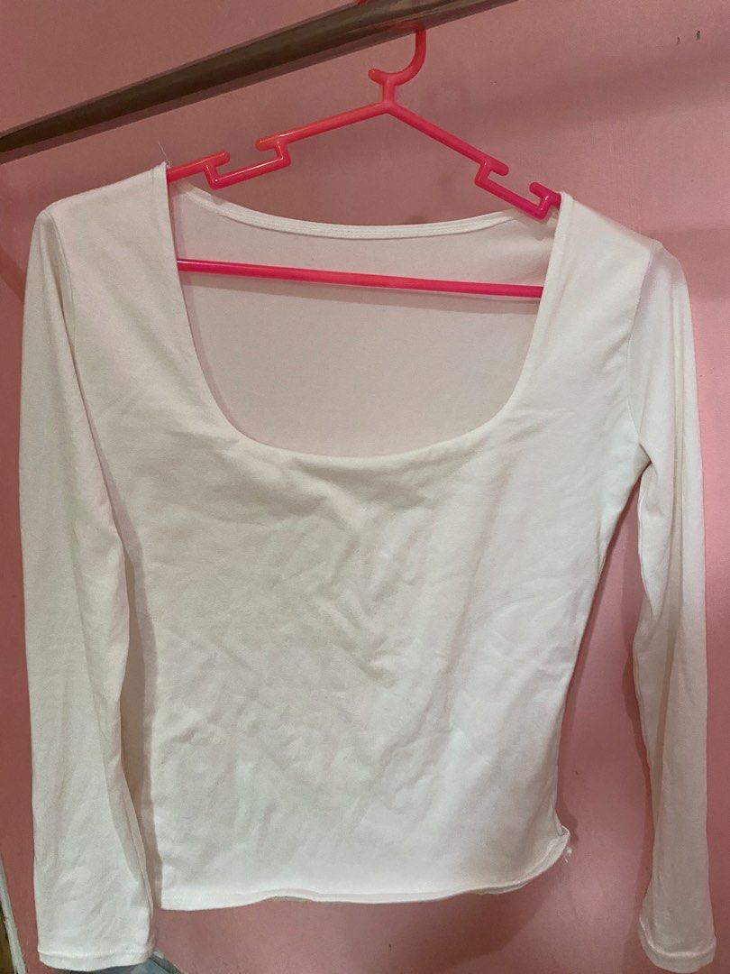 White Long Sleeve Square Neck Cropped Top (Category: Blouses) located in Tanauan. Submitted by rie098 (Listing ID 1463276712, Image 3). Description: - Basic white long sleeve top - Square neckline - Cropped fit - Stretchy material for comfort - Effortlessly pairs with jeans, skirts, or for layering.