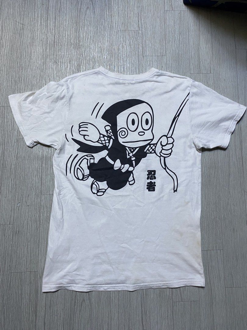 White Ninja Hattori-kun (Category: Tshirts & Polo Shirts ) located in Pasig City. Submitted by terrencec34805 (Listing ID 1463283994, Image 3). Description: Ninja Hattori-kun Multiple characters printed on the front In very good condition need wash only Size:Large Width:19.5 Length:28.