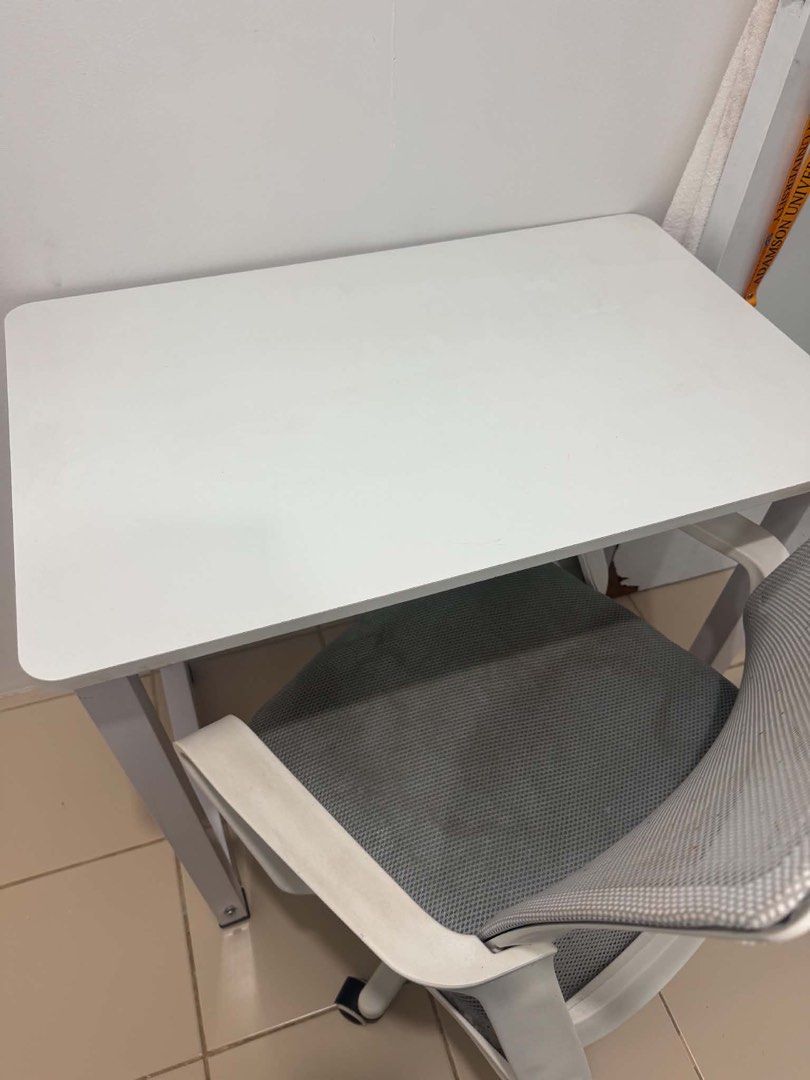 White Study Desk with Mesh Office Chair (Category: Office Furniture & Fixtures) located in Rizal. Submitted by _shinnnb (Listing ID 1463223929, Image 3). Description: - White study desk with safe rounded corners - Grey mesh office chair with easy-roll wheels - Ideal for home office or study space - Sold as a convenient set - Pick up only.