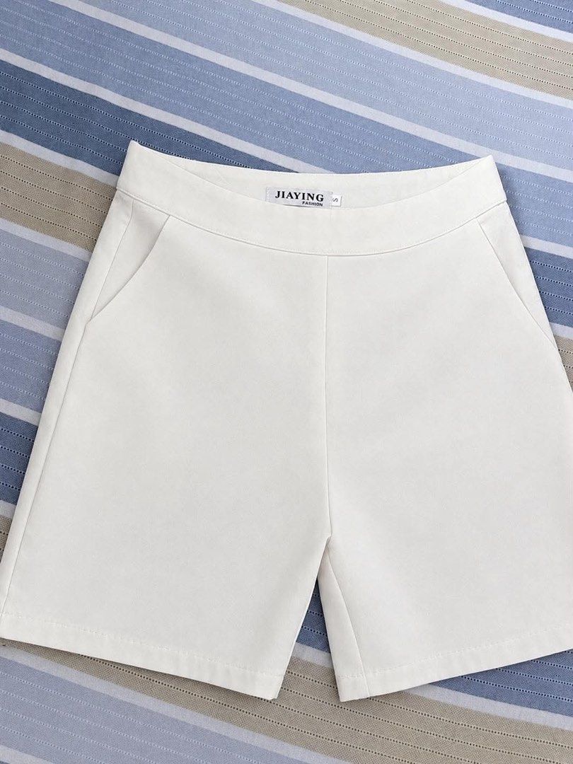 White tailored women's shorts (Category: Shorts) located in Manila. Submitted by _auraq11 (Listing ID 1463190725, Image 2). Description: 16 inch long 11-12 inch waist.