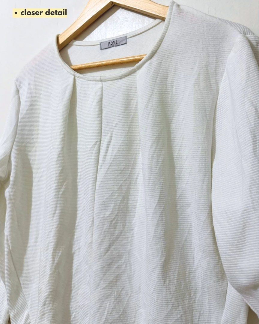 White Textured Long Sleeve Top (Category: Longsleeves) located in Subic. Submitted by ciesells (Listing ID 1463152523, Image 2). Description: Bust: 42 (medium-large) Sleeve: 20 inches - Textured fabric with subtle vertical pleats on front - Simple round neckline - Comfortable and easy to style mop: bpi/maya/maribank.