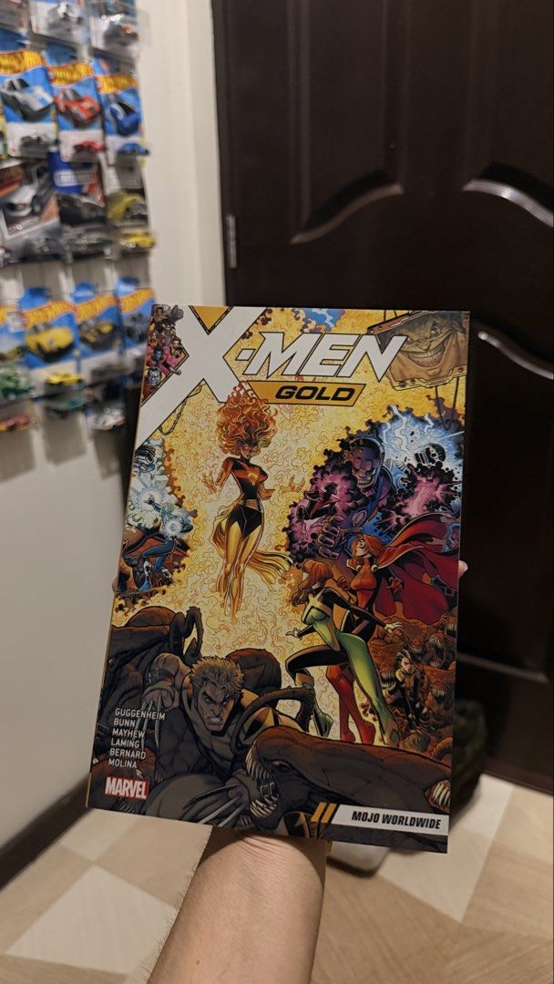X-Men Gold Comic Book (Category: Comics & Manga) located in San Fernando. Submitted by goodiespin (Listing ID 1463269997, Image 1). Description: - X-Men Gold comic book - Features a vibrant cover with multiple characters - Written by Guggenheim, Bunn, Mayhew, Laming, Bernard, and Molina - Published by Marvel Comics - Mojo Worldwide storyline.