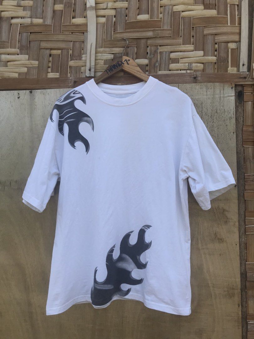 Y2k Flames White Tee (Category: Tshirts & Polo Shirts ) located in Lapu Lapu. Submitted by thanicxthriftz (Listing ID 1463235716, Image 2). Description: 24x28 No issue Ready to wear.