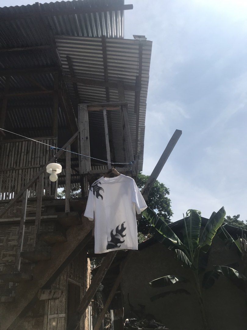 Y2k Flames White Tee (Category: Tshirts & Polo Shirts ) located in Lapu Lapu. Submitted by thanicxthriftz (Listing ID 1463235716, Image 1). Description: 24x28 No issue Ready to wear.