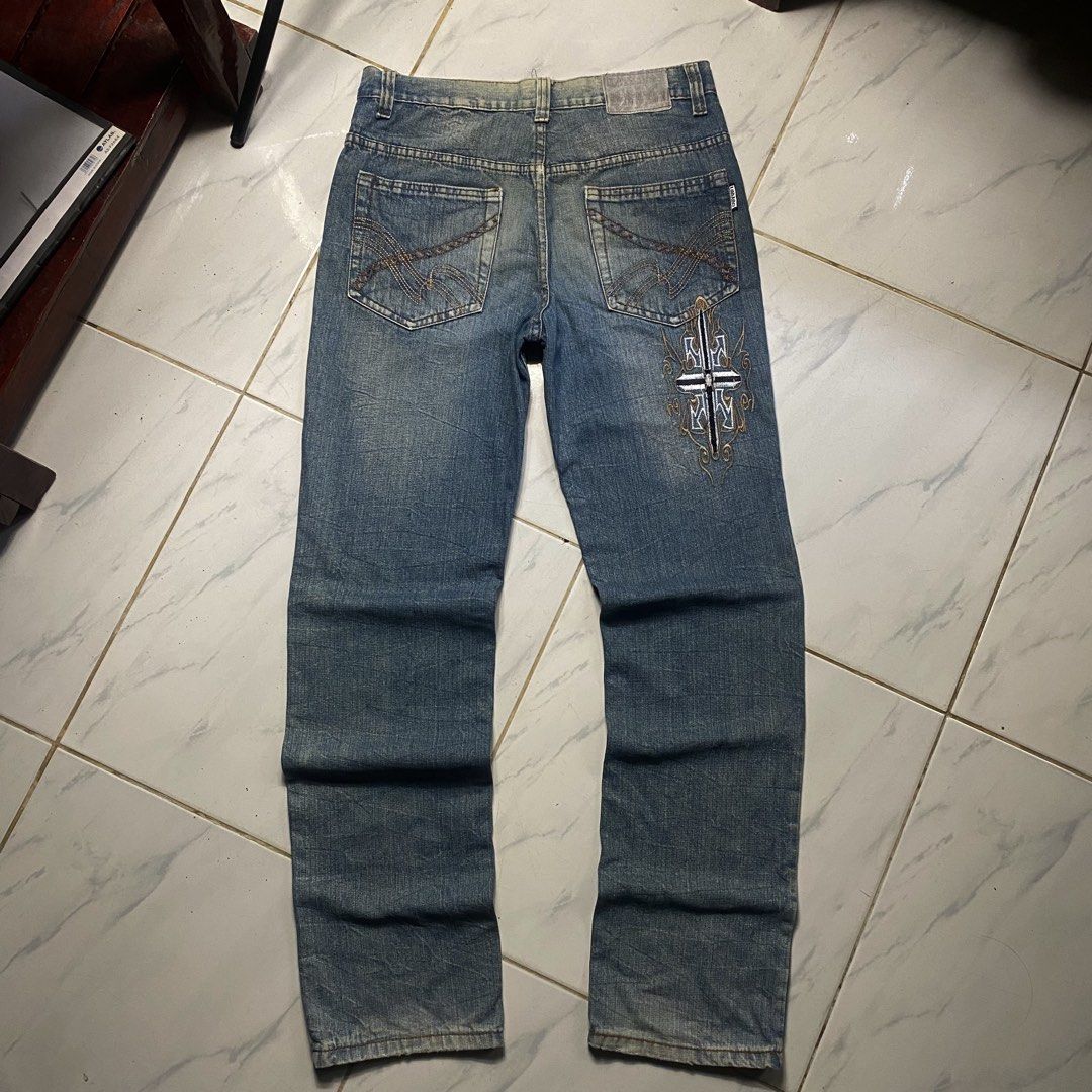 Y2k Jeans Pants Embroidered Cross Design (Category: Jeans) located in Camiling. Submitted by camthrift_2024 (Listing ID 1463167891, Image 1). Description: Y2k EMBROIDERED DESIGN PANTS WAIST:32 THIGH:10 LENGHT:42 LEG OPENING/HEM: 7.5 COLOR RATE: 9/10 ISSUE:sign of usage 300₱ SHIP NOW OPEN FOR TERMS UNLI VOUCH GCASH JNT CAMILING, TARLAC📌 - Brand: Lian Xing - Type: Blue Denim Jeans - Size: 31 - Design: Embroidered cross on right leg - Wash: Classic