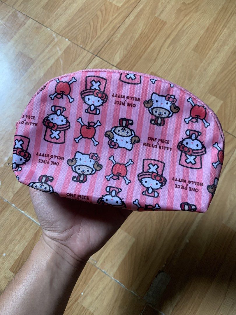 Y2K One piece x Hello kitty small pouch (Category: Belt bags, Clutches and Pouches) located in Cagayan de Oro. Submitted by premium_thrifts (Listing ID 1463145901, Image 1). Description: Excellent condition. Pink colorway Issue: none Add shipping fee (via JRS or J&T).