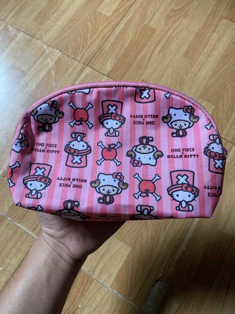 Y2K One piece x Hello kitty small pouch (Category: Belt bags, Clutches and Pouches) located in Cagayan de Oro. Submitted by premium_thrifts (Listing ID 1463145901, Image 2). Description: Excellent condition. Pink colorway Issue: none Add shipping fee (via JRS or J&T).
