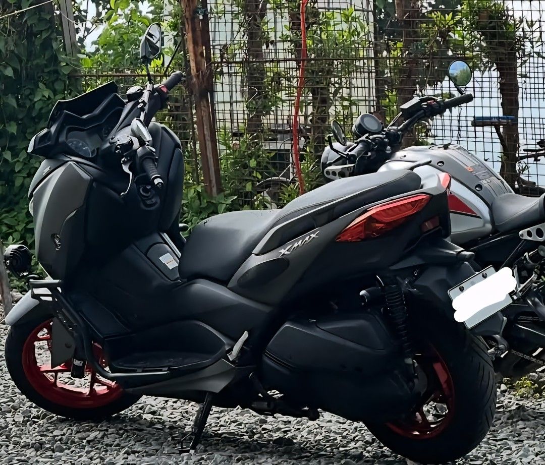 Yamaha XMAX V1 (Category: Motorbikes for Sale) located in Manila. Submitted by harvey_specter2301 (Listing ID 1463231343, Image 2). Description: Yamaha XMAX V1 2018 16,XXX ODO Complete Original Documents Spare Remote With Red Code Eurogrip Bee Oversize Tires Driving Lights Crashguard Registered Til August 2027 Under my name Note: - Cat Scratches sa seat - Missing 2 bolts *No engine/mechanical issues Strictly for pickup only parked infront of bara