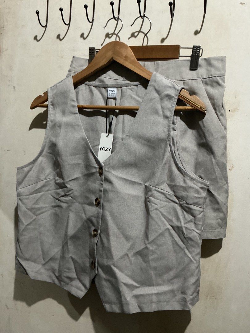 YOZY VEST TOP AND TROUSER SHORT SET (Category: Sets or Coordinates) located in Dagupan City. Submitted by trendies_collection (Listing ID 1463310046, Image 2). Description: Brand new with pouch and hang tag Large on tag, fit up to semi xl Parang cotton linen tela No issue .
