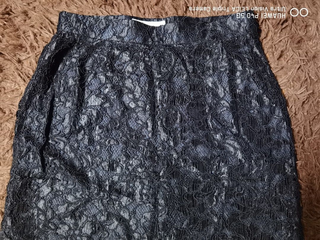 Ysl Skirt (Category: Skirts) located in Manila. Submitted by reddvelasquez.2 (Listing ID 1463129250, Image 3). Description: Yves Saint Laurent Skirt 25 Waistline 21 Length Like New Condition No issues 1800 pesos PM .