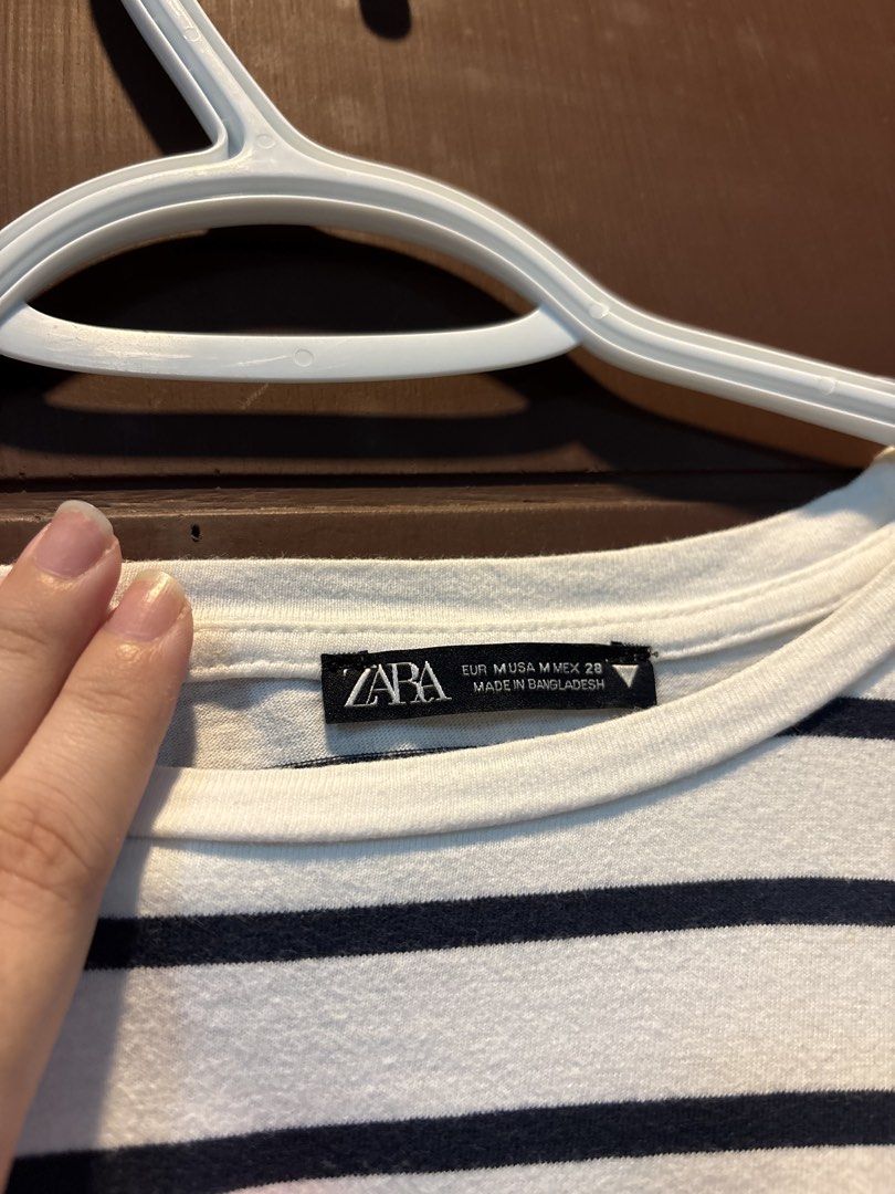ZARA — Striped Crop Shirt (Category: Shirts) located in Paranaque City. Submitted by margauxm (Listing ID 1463325095, Image 2). Description: [ZARA — Striped Crop Shirt] — In Medium Size — Well-used! However, still in super good condition — Cropped fit, has a garter by the waist area — Super comfortable!!! Perfect for everyday and for errands day — No stains, runs or damage on the item, see photos! RFS: Decluttering .