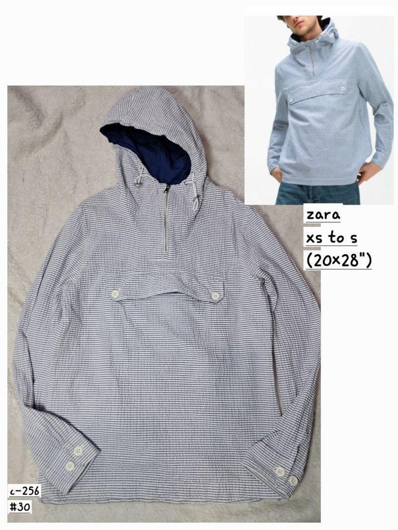 Zara anorak windbreaker jacket (Category: Coats, Jackets and Outerwear) located in Baguio. Submitted by mishmashfritz (Listing ID 1463196991, Image 1). Description: xs to s unisex, see dimes for reference,1 side zipper, adjustable hood, nylon lining sa hood, Blue and white striped seersucker fabric featuring puckered vertical stripes..