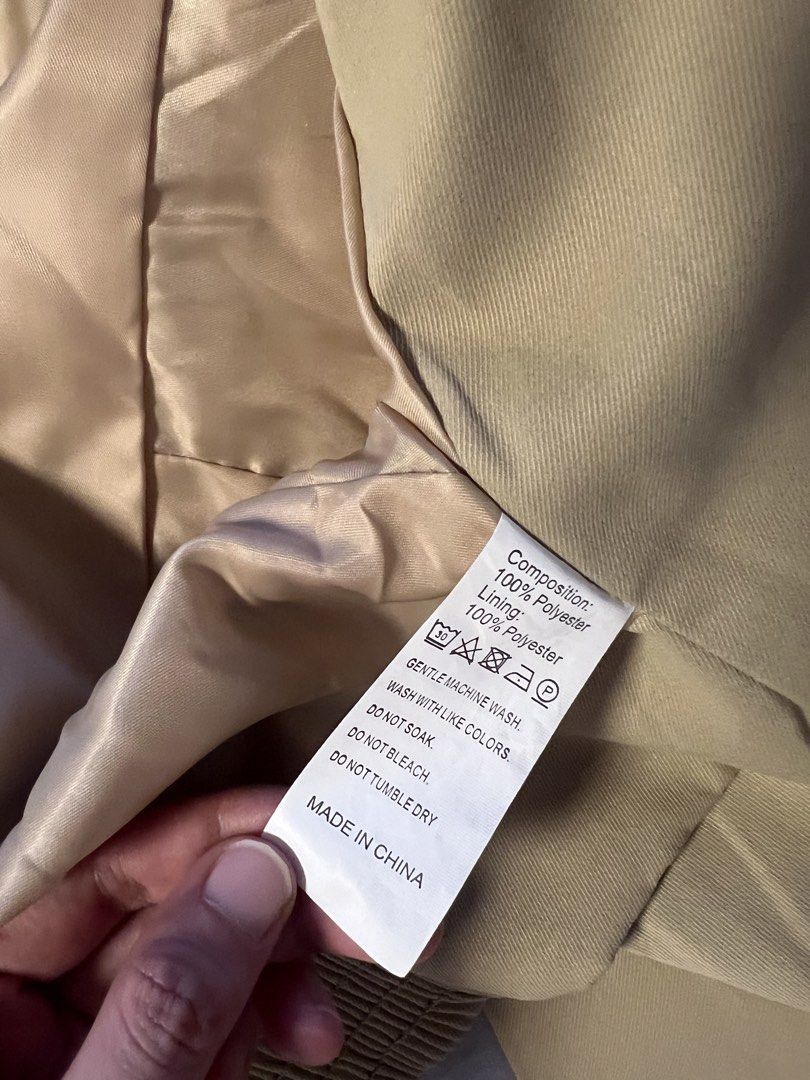 Zara Beige Cropped Wrap Jacket (Category: Coats, Jackets and Outerwear) located in Makati City. Submitted by warm.abc123 (Listing ID 1463253513, Image 3). Description: - Zara cropped jacket - Color: Beige - Size: S - Material: Polyester with satin lining - Design: Unique wrap style with statement sleeves - Versatile: Great for dressing up or down - Condition: Brand new with original tags attached, -never worn, hard to let go but impulsively bough