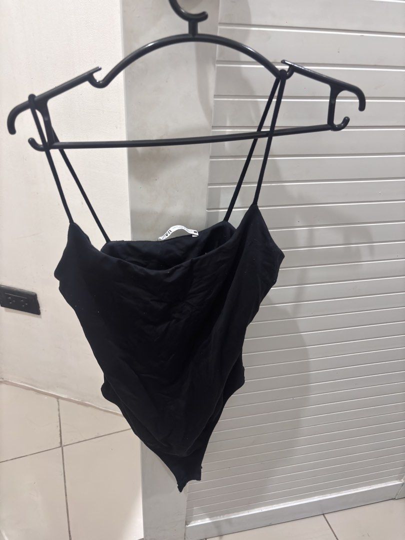 Zara Black Bodysuit (Category: Blouses) located in Manila. Submitted by xoxo_tine (Listing ID 1463239583, Image 2). Description: - Zara Top - Color: Black - Size: M (EUR/USA/MEX 28) - Made in Turkey - Versatile and basic design - Ideal for everyday wear.