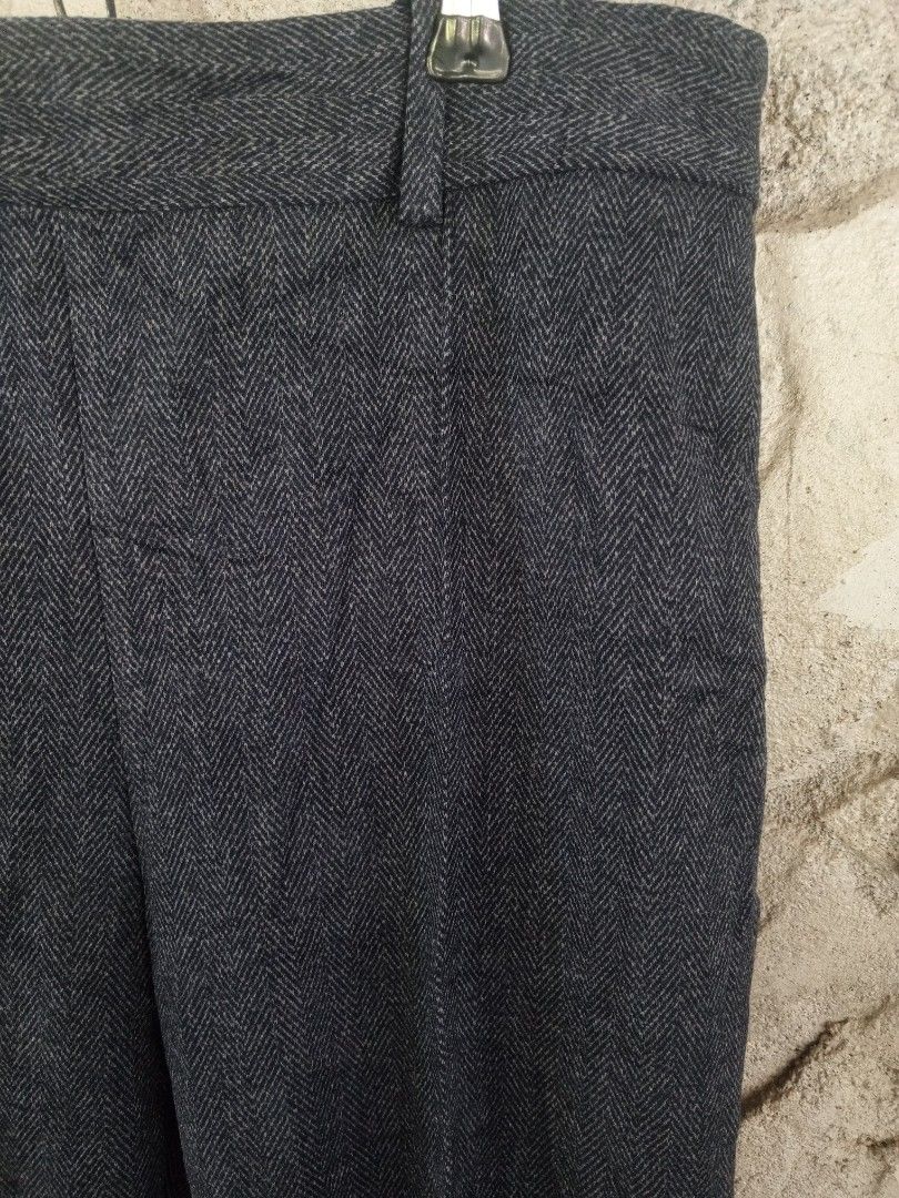 Zara Herringbone Trousers (Category: Other Bottoms) located in Orani. Submitted by thriftniea (Listing ID 1463206796, Image 2). Description: W34 L40 H7.5 - Zara dark grey trousers - Classic herringbone pattern - Straight leg cut - Button and zip closure - Two functional front pockets - Versatile for work or casual outfits - Comfortable fit.