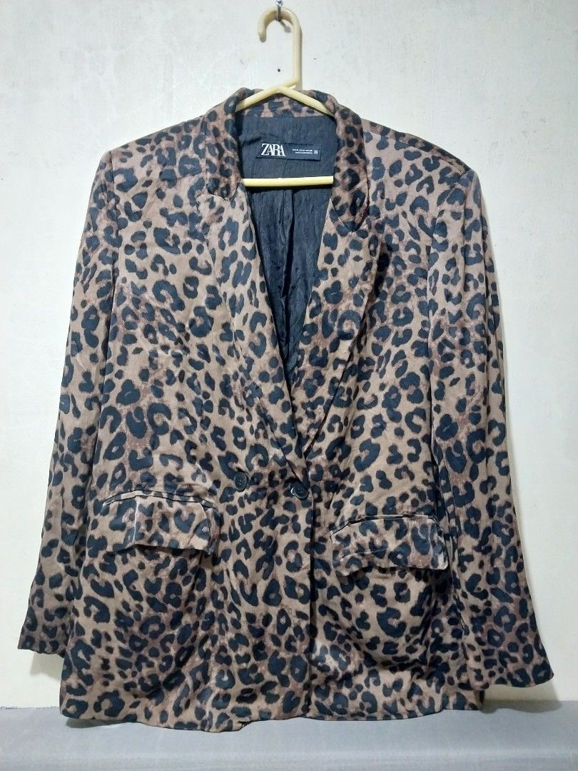 ZARA Leopard Print women Blazer (Category: Coats, Jackets and Outerwear) located in Manila. Submitted by PrinceDani.Clothing (Listing ID 1463238432, Image 2). Description: zara leopard print blazer large fit 21.5in width 29in length issue: pinhole in 1 sleeve see pix excellent condition .