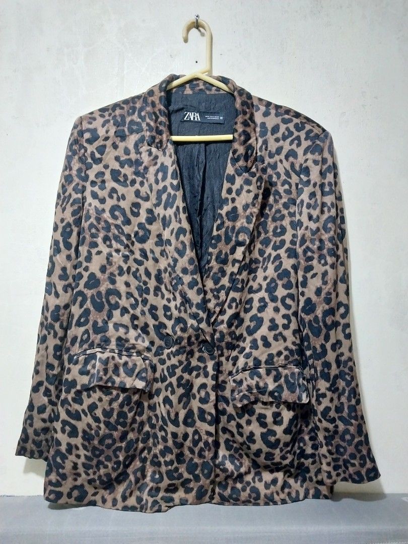 ZARA Leopard Print women Blazer (Category: Coats, Jackets and Outerwear) located in Manila. Submitted by PrinceDani.Clothing (Listing ID 1463238432, Image 1). Description: zara leopard print blazer large fit 21.5in width 29in length issue: pinhole in 1 sleeve see pix excellent condition .