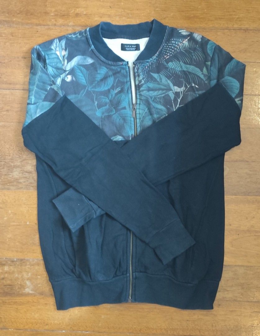 Zara Man Bomber Jacket Floral Print (Category: Coats, Jackets and Outerwear) located in Paranaque City. Submitted by kingsly42 (Listing ID 1463174770, Image 1). Description: Dimes: chest: 18.5 inches shoulder: 17.5 inches sleeve: 6.5 inches body: 27 inches.